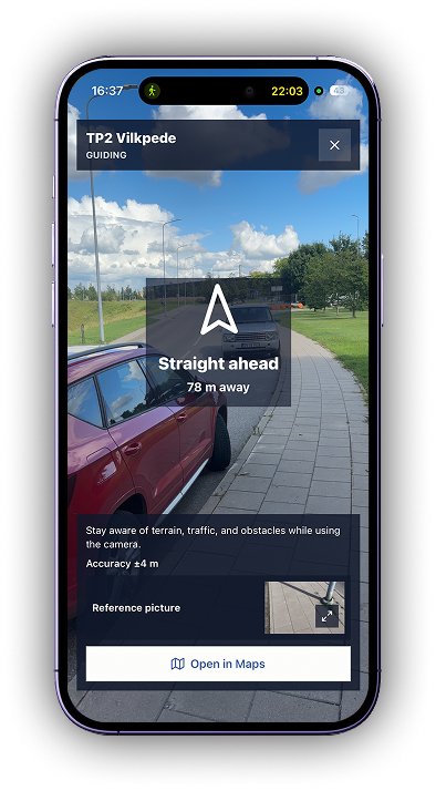 Camera guide on the phone showing a live camera view with a direction arrow, distance to the control point, position accuracy, and the reference picture